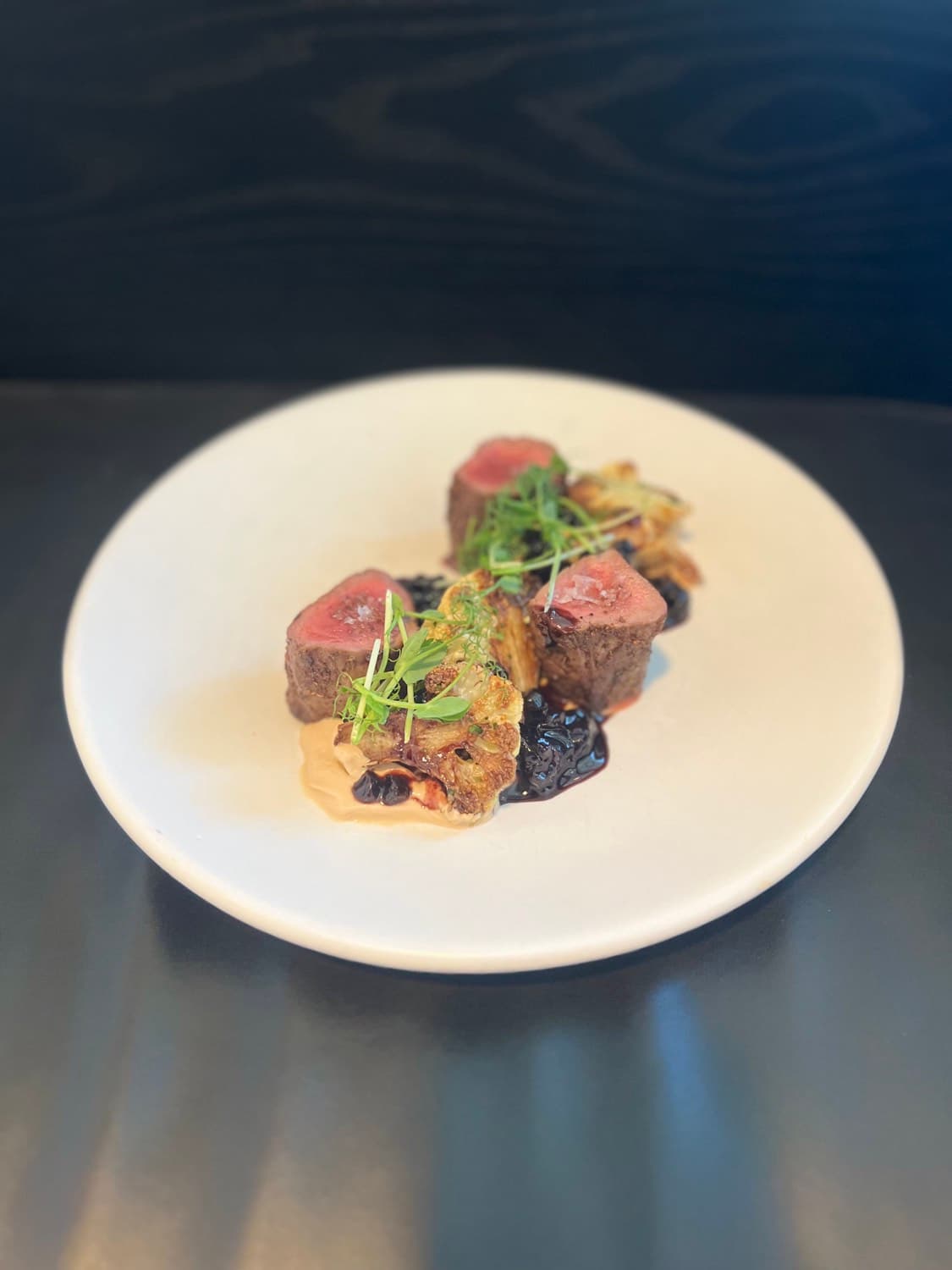 Modern American plated course prepared by Chef Shane Graybeal